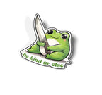 Sticker of a green frog holding a knife with 'be kind or else' text on a white background