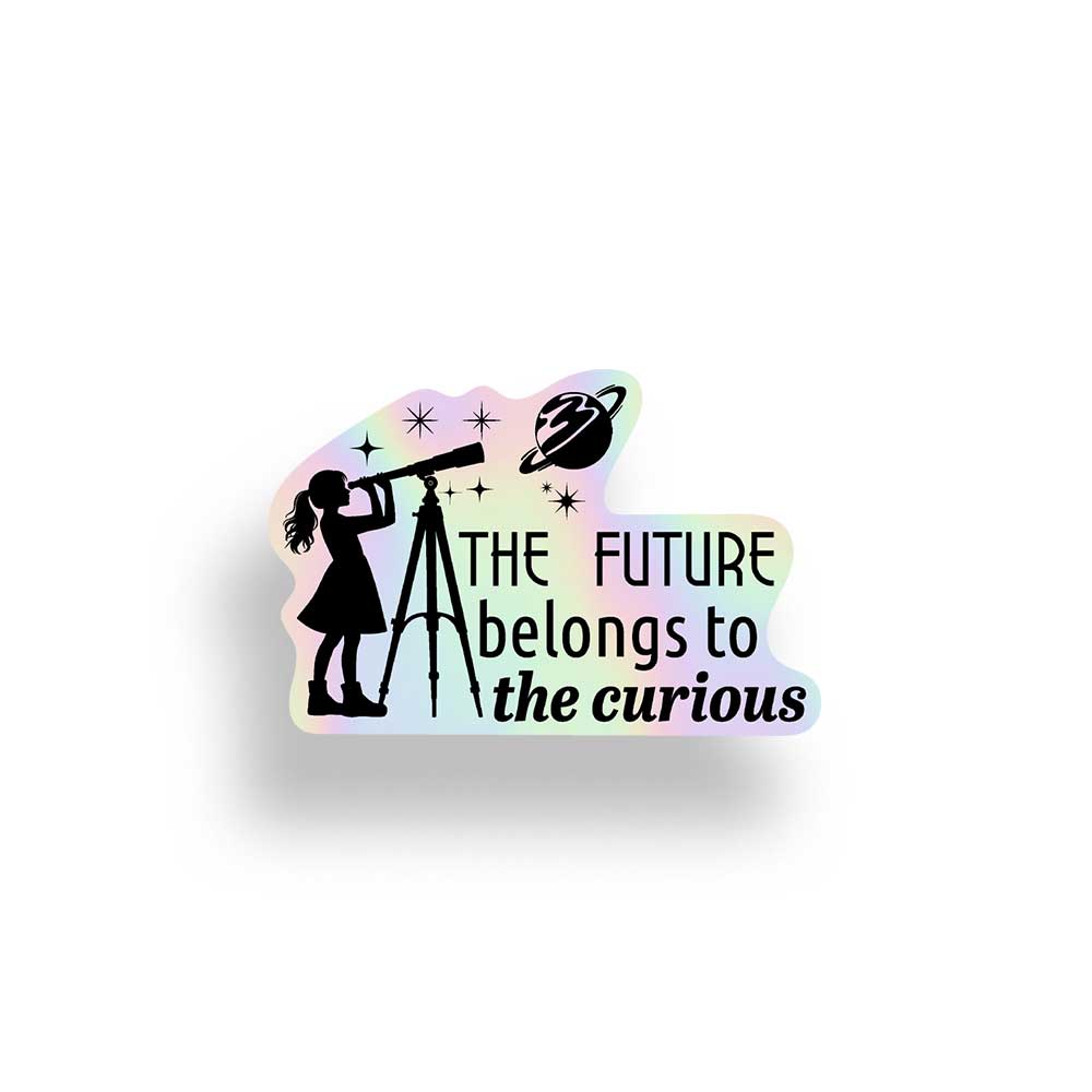 A die-cut sticker featuring a black silhouette of a girl looking through a telescope next to a black planet with a ring, with the text 'THE FUTURE belongs to the curious' in black. The sticker has a pastel rainbow gradient background and is shown on a white background with a drop shadow.