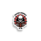 Sticker with a skull reading a book surrounded by roses and 'Trigger Warning? I'm In!' text on a white background.